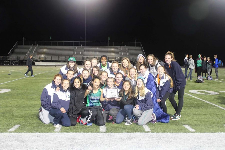 Lady+Wolverines+pose+with+their+first+place+trophy.+