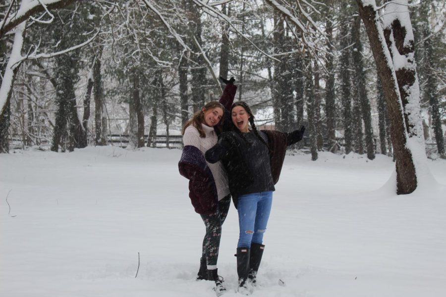 Carissa+Vergeres+and+Mia+Cammarota+pose+in+the+snow.