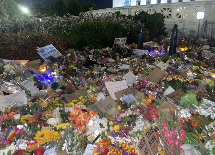 Photo by Maryam Khan.
Flowers and signs lay outside of the U.S. Supreme Court building in memoriam of Ruth Bader Ginsburg the day after her passing.