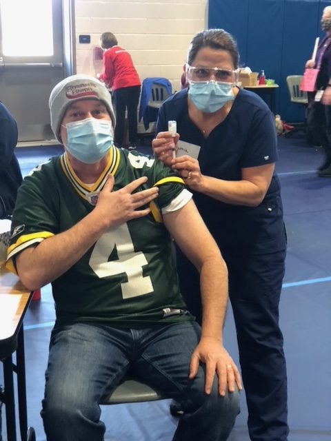 Harmony Middle School Principal Eric Stewart receiving his COVID-19 vaccination. Photo provided by Carissa Vergeres. 