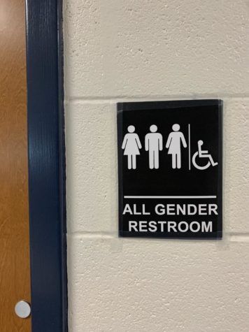 The newly installed all-gender restroom sign at Woodgrove High School.