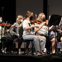 Woodgrove’s string orchestra performs a song for the winter holiday concert on December 17.