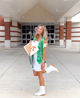 Ashley Moriarty, 2021 graduate, poses in front of Woodgrove High School after her graduation ceremony. 