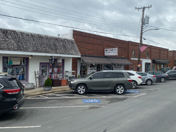 The photo above captures the stores located along N 21st Street, including Re-Love It. 