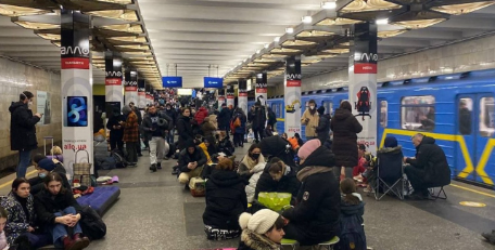 Ukrainian refugees huddle in a metro station during the Russian invasion of Kyiv.