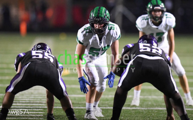 Fuchs lined up across for his opponent, waiting to rush the quarterback.