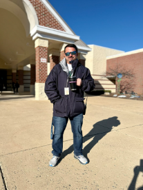 Woodgrove’s School Security Officer, Mr. Ward Sigler, standing out front of the building greeting students.