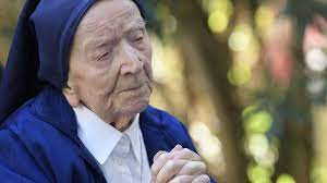 Sister Andrè praying.