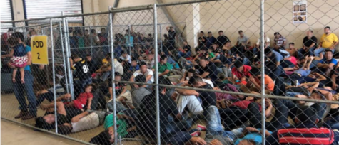 Migrants are seen detained in a U.S. Detention Facility. 