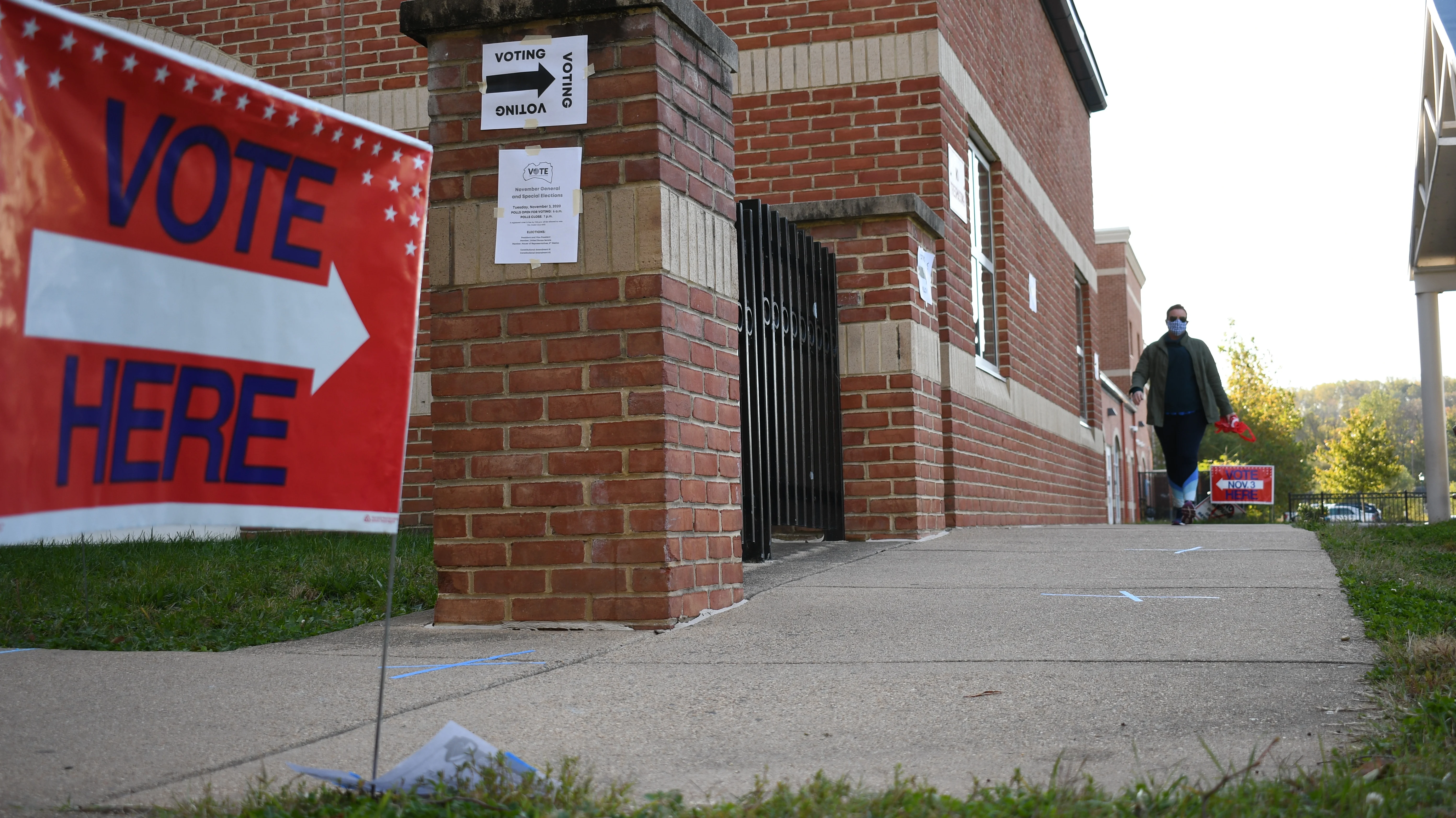 A woman exits a voting center. Photo provided by Creative Commons.
