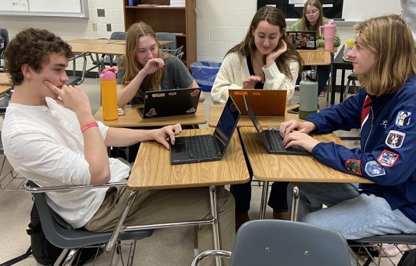The junior class council discusses plans for the rest of the year. Pictured (left to right): Brooks Frandsen, Chelsea MacInnes, Lillian Hackett, and Connor Felmey. Photo provided by