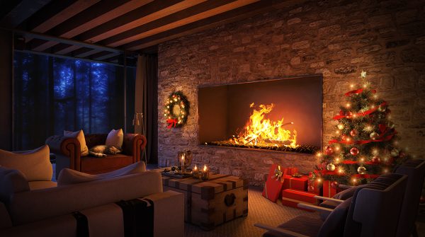Cozy living room accompanied by a fireplace and a Christmas tree. Photo provided by Creative Commons.