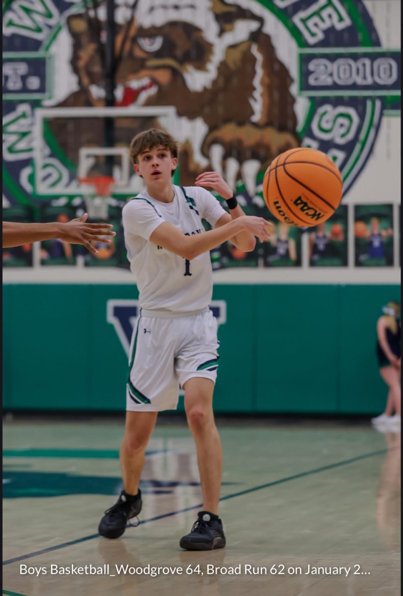 Senior Jack Hill makes a pass to a teammate against Broad Run. Photo provided by action.jackson.photo