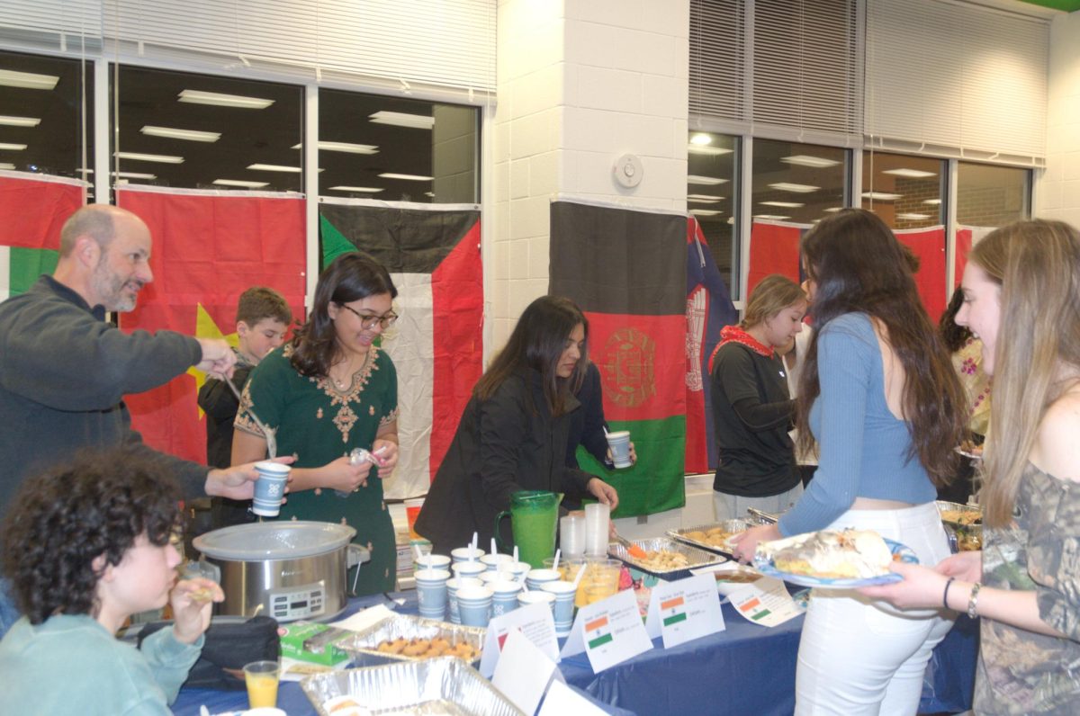 Woodgrove students fill their plates on International Food Night. Photo provided by Salma Jawad.