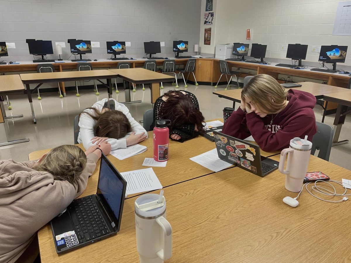 Students resting in class. Photo provided by Sophie Mason.