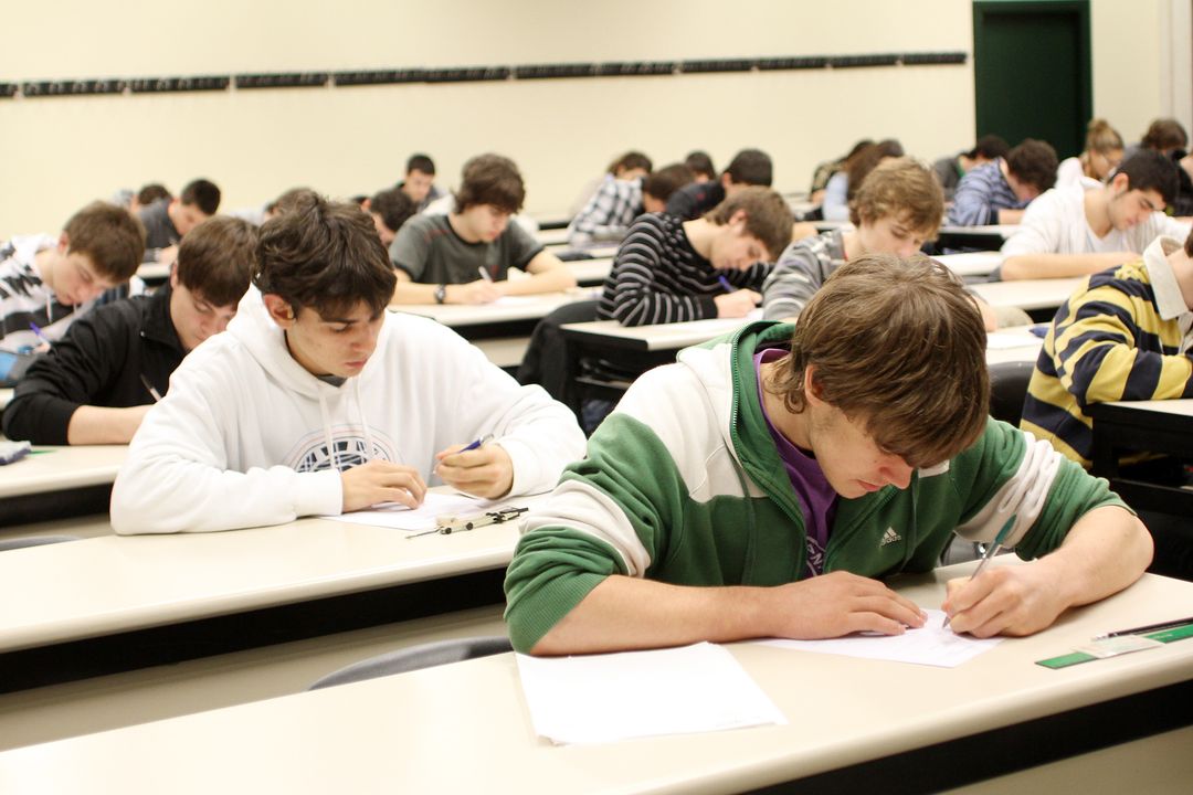 Students thoroughly complete a test. Photo provided by Creative Commons. 