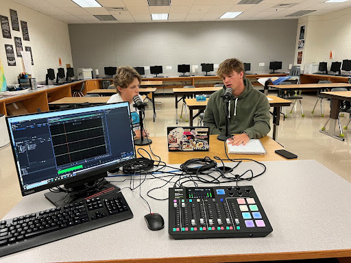 Senior Prescott Noll and Editor of the Outlander John Hays recording an episode of their podcast the Athletic Equation. Picture provided by Mrs. Dyke.

