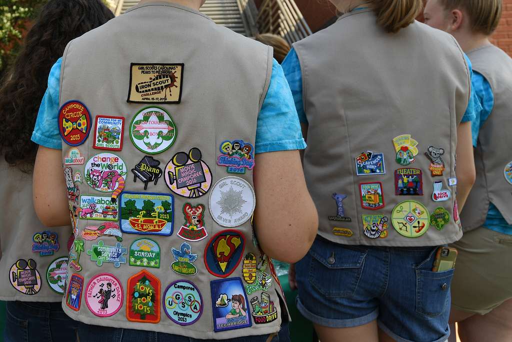 The back of two girl scout vests. Photo provided by Creative Commons.
