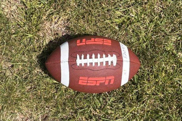 A football lays in the grass at Woodgrove High School. Photo provided by Vivien Wohlfeil.