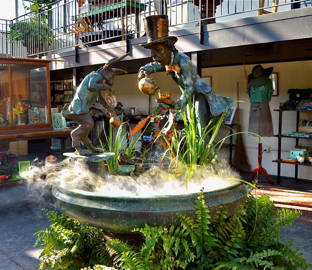 The bronze garden fountain featuring the Mad Hatter and the White Rabbit from Alice's Adventures in Wonderland. Photo provided by Cadence Carter.