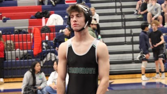 Senior Adam Skinner prepares for a wrestling match. Photo provided by Zac Hartley.
