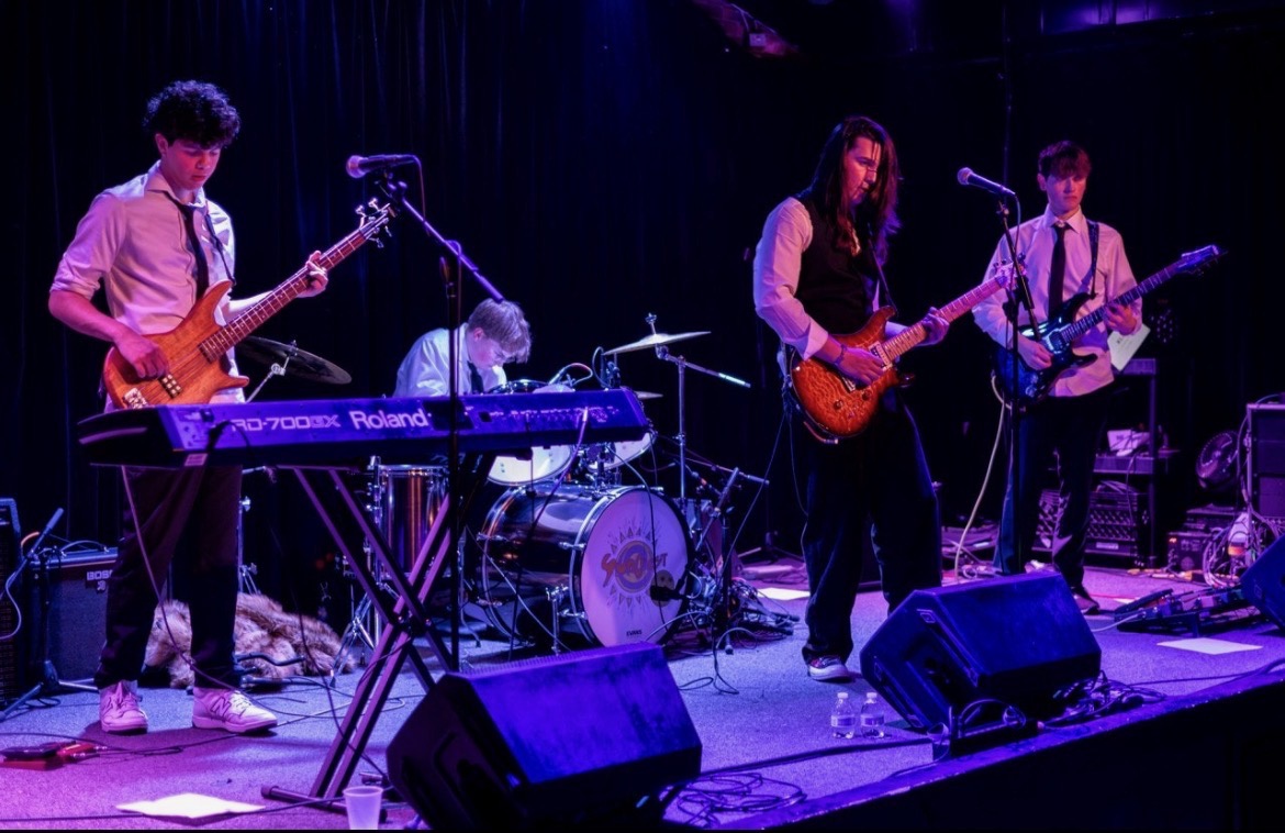Suncrest plays onstage during one of their shows. Photo provided by Will Schweiker.
